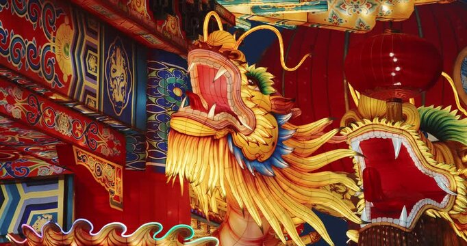 Beijing, China. Large Lantern Composition At Zigong Lantern Festival. National Color. Traditional Red Chinese Gate Pailou or Paifang, Close Up View. Chinese Dragons Are Mythological Birds. Symbolize