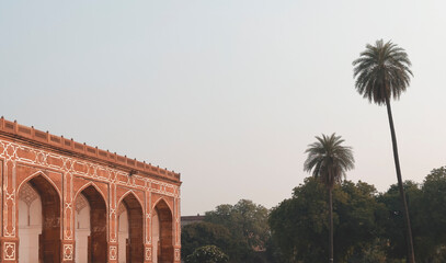 Fototapeta premium red sandstone arcade at the Humayun s Tomb complex in Delhi, India, with its characteristic white