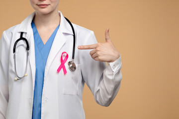 Doctor With Pink Ribbon Supporting Breast Cancer Awareness