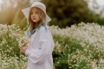 A teenage girl with colorful hair and a stylish hat explores a sunlit daisy field, radiating...