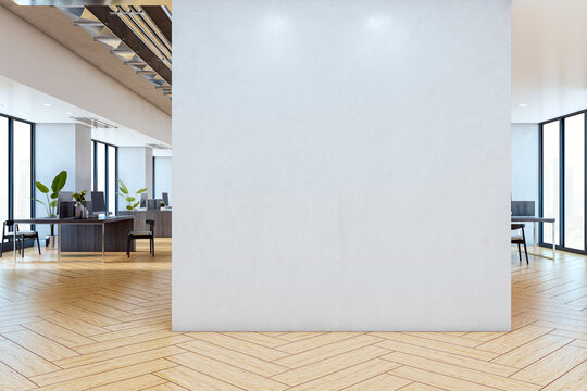 Blank white wall mockup in modern corporate office interior with wooden floor and glass windows offering city view, perfect for logo or poster display. 3D Rendering