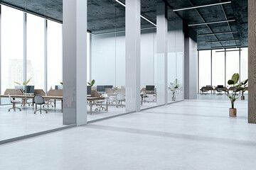 Modern empty office corridor with glass partitions and city view in contemporary corporate building...