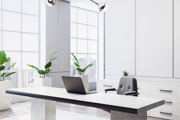 Modern executive office interior with marble desk, leather chair, laptop, and large windows...