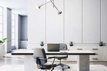 Modern luxury executive office interior with clean workspace, desk, chairs, natural light, and...