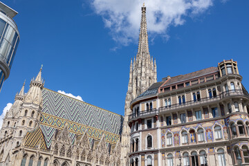 Soaring Spires and Intricate Details, Exterior facade of St. Stephen's Cathedral and neighboring Building  in Vienna, Austria