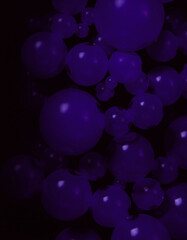 A collection of purple spheres illuminated against a dark background, creating a vibrant and mysterious visual display