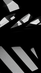 Close-up of a black and white striped pattern with high contrast and bold lines, creating an abstract and dynamic visual effect
