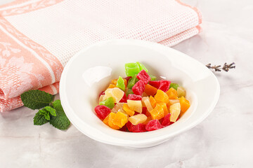 Sweet candied papaya colorful pieses