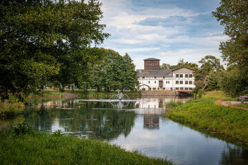Medieval water mill and the pond. Historic district Oliwa in Gdansk