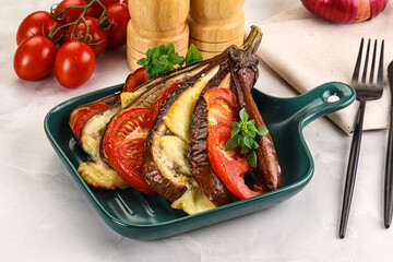 Baked tomato with mozzarella and tomato