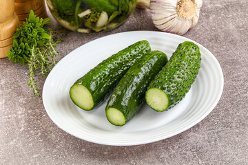 Homemade lighty salted cucumbers with herbs