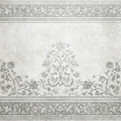 A white wall with a floral design