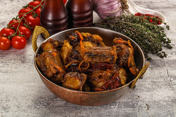 Baked oztail with tomato and carrot