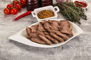Sliced boiled pork tongue snack