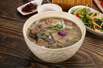 Vietnamese Pho Bo soup with beef and noodles
