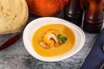 Pumpkin cream soup with prawns