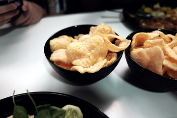 Crunchy prawn crackers, a delightful snack perfect for sharing.