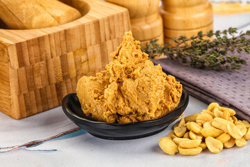 Crunchy peanut butter fat product