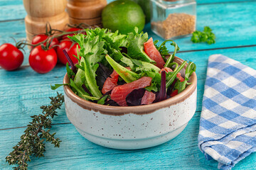 Salad with salmon and arugula