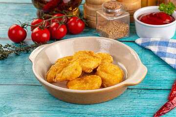 Golden crispy fried chicken nuggets