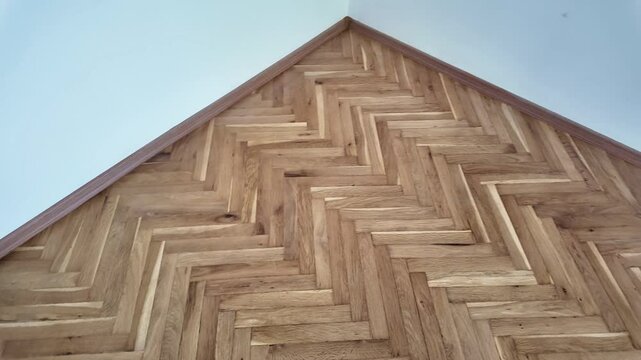 New laminate flooring. Laminated parquet with brown wooden texture