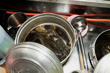 A steaming pot of ginger broth, ready to warm you up with Sekoteng and Wedang Ronde, a traditional...