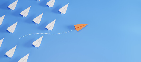 Orange paper plane flying in different direction from white planes on blue background. Concept of leadership, innovation, thinking differently, and standing out.