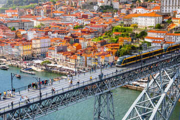 Famous bridge Ponte dom Luis above old town of Porto at river Duoro, Portugal