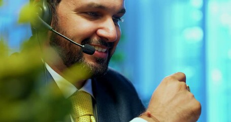 Indian businessman in call centre, Indian Asian corporate executive wearing headset and busy in communication, symbol of customer service, tech support, remote assistance, global connectivity
