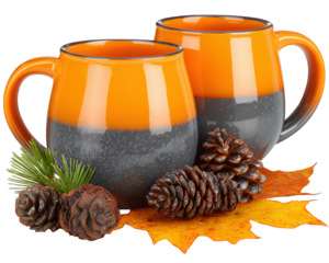 Two orange and gray ceramic coffee mugs with round handles sit on autumn maple leaves, surrounded by pinecones and evergreen sprigs, creating cozy seasonal atmosphere