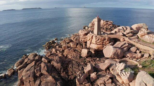 Men Ruz lighthouse in Ploumanach on the Pink Granite Coast, Brittany, France