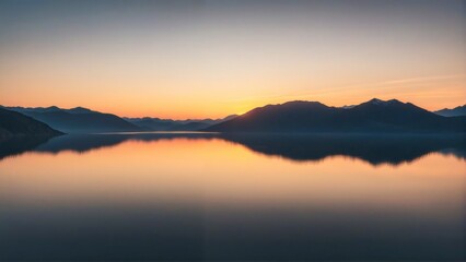 Vibrant Sunset Over Lake and Mountains
