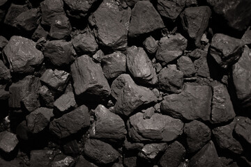 Natural black coals for background.