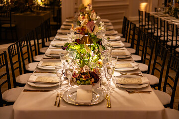 Elegant Long Table Wedding Dinner with Floral Centerpieces