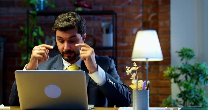 Indian businessman suffering from headache while working in office, Asian corporate executive under stress and mental pressure, symbol of burnout, workplace fatigue, health issues, anxiety