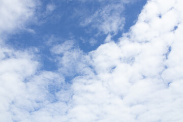 Bright Blue Sky With Fluffy Clouds