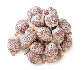 Pile of mini sausages isolated on a white. Top view