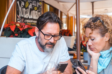Happy couple enjoying meal at restaurant – romantic date, vacation mood, weekend vibes, relationship and quality time concept