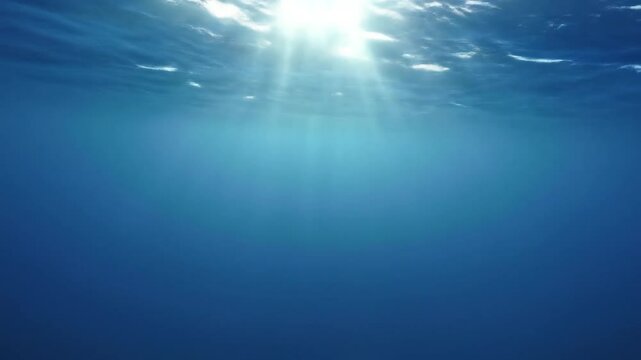 Underwater view of sunlight through water