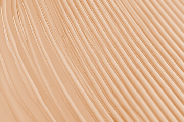 Texture of smudge cosmetic bb or cc cream foundation liquid background. a copy of the space. Chic cosmetic liquid foundation. Makeup Concept.