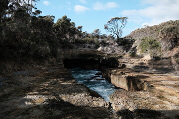 The Blowhole near Hobart, Tasmania, erupts with powerful jets of ocean water. This natural wonder...
