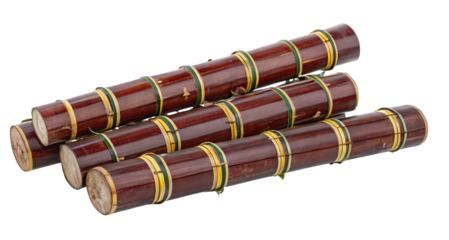 Colorful bundles of sugar cane arranged for sale in market closeup image with stacked arrangement