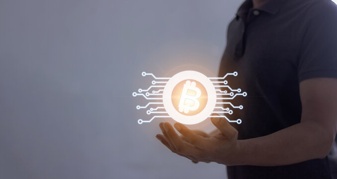 Young man using smartphone mobile hand touching to trade cryptocurrencies online, Investors in cryptocurrencies and bitcoin coins online