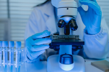 two scientists are working together to find a new antiviral drug, two chemists are using scientific...