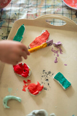 Childrens kids crafts palette colour paint mixing colourful hands