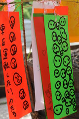 Tanabata festival (Star Festival) in Japan. Colorful paper tags called tanzaku with written wishes hanging on bamboo branches in summer.