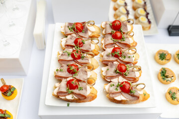 Festive buffet. Table with desserts in glass and snacks. Catering. Buffet. Self-service. Hotel and...