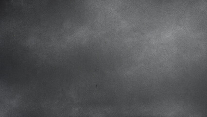 Dark black monochrome stone texture background. Top view, free space for text or design.