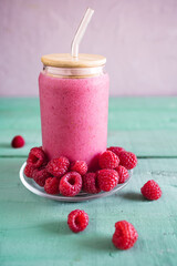 A vibrant smoothie made with fresh raspberries, rich in antioxidants and essential vitamins.