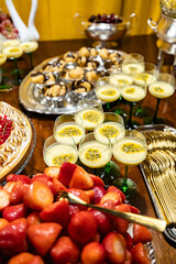 Passion Fruit Panna Cotta and Fresh Strawberries Dessert Table